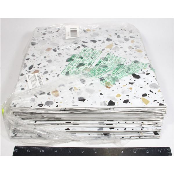12X12 PEEL AND STICK PILES. 45 TILES TOTAL