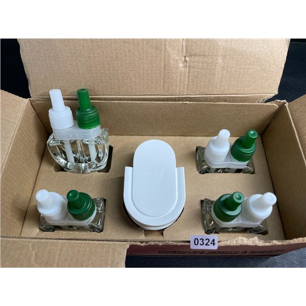 1 Febreze Plug-In Air Freshener Warmer Set with 4 Scent Refills - New