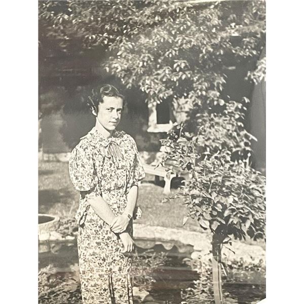 Woman in garden vintage photo