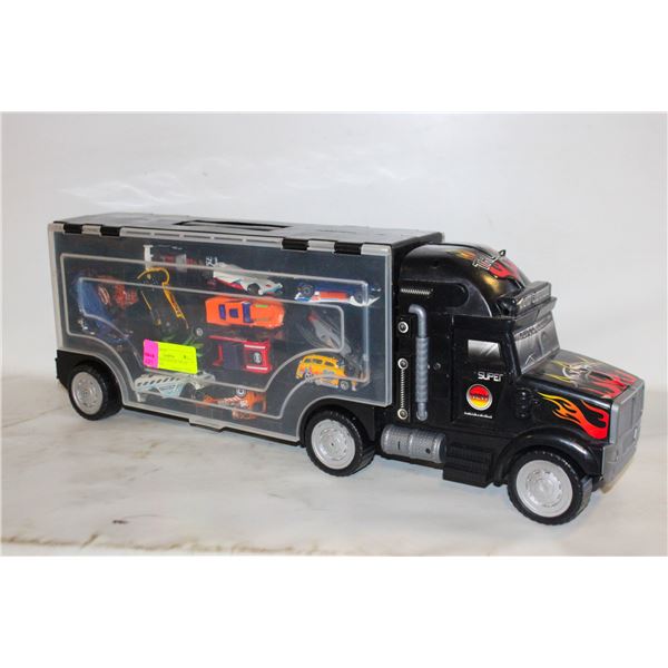 28 HOT WHEELS IN SEMI-TRUCK CARRY CASE,