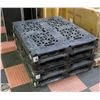 Image 1 : STACK OF 4 PLASTIC PALLETS