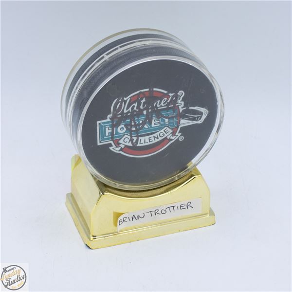BRIAN TROTTIER SIGNED PUCK IN HOLDER NO COA
