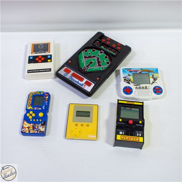 TRAY OF HAND-HELD ELECTRONIC GAMES