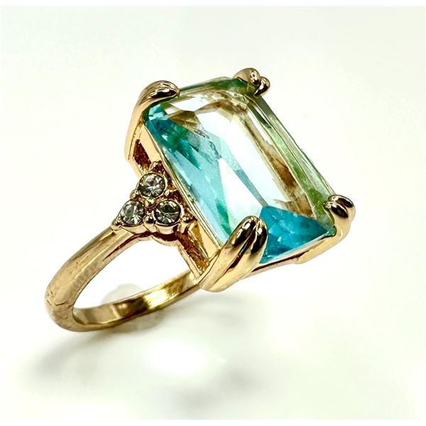 Breathtaking 14 kt Yellow Gold Plate 6.5 Ct Emerald Cut Simulated Sky Blue Topaz Ring