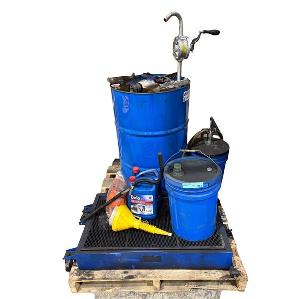 Group of workshop items - blue drum with rotary pump and oil, drip tray, yellow funnel etc.