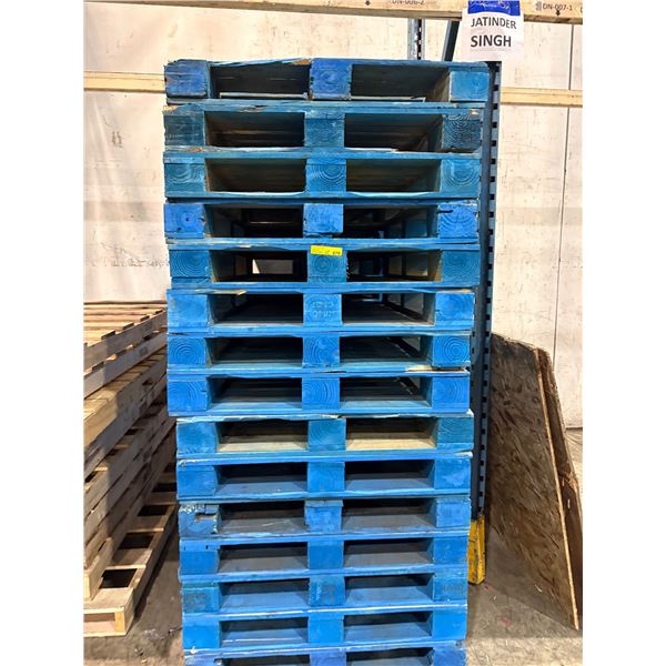 Large lot of blue standard heavy pallets