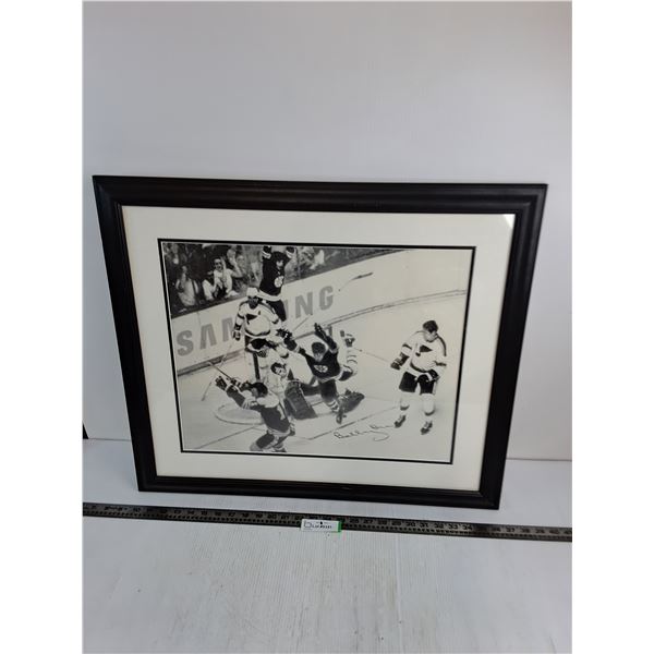 Framed Autographed 27" x 23" Picture of Bobby Orr's Iconic 1970 Cup Clinching Goal - Unauthenticated