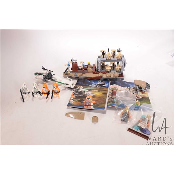 Lego "Star Wars" including two pre-built kits nos. 7929 and 7913, both appear complete but completen