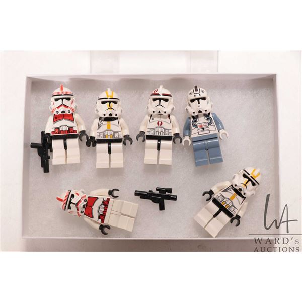 Lego "Star Wars" six mini Storm Trooper figures including yellow and red markings