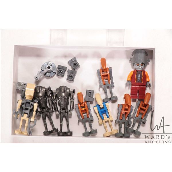 Lego "Star Wars" mini figures including Nute Gunray, three Rocket Droids, Rocket Droid Commander, Pi