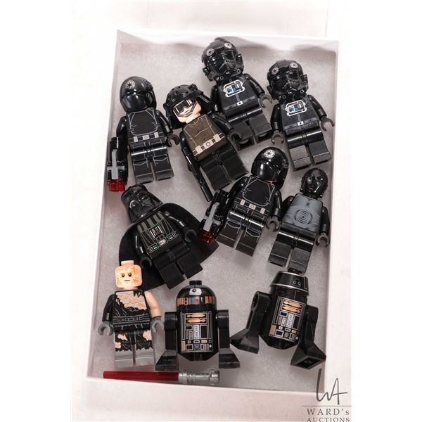 Lego "Star Wars" mini figures including Darth Vadar, two Imperial Gunners, Deathstar Trooper, two TI