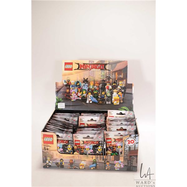 Lego retail display box containing 60 count of The Ninjago Movie Minifigures, all new in packaging