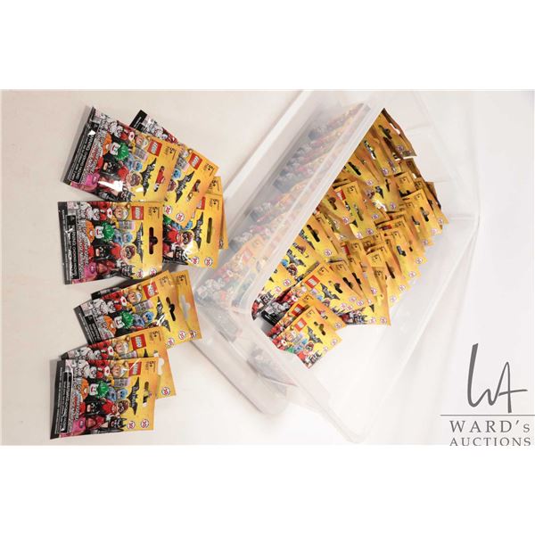 Tub containing 60 count of Lego Batman the Movie limited edition Minifigures