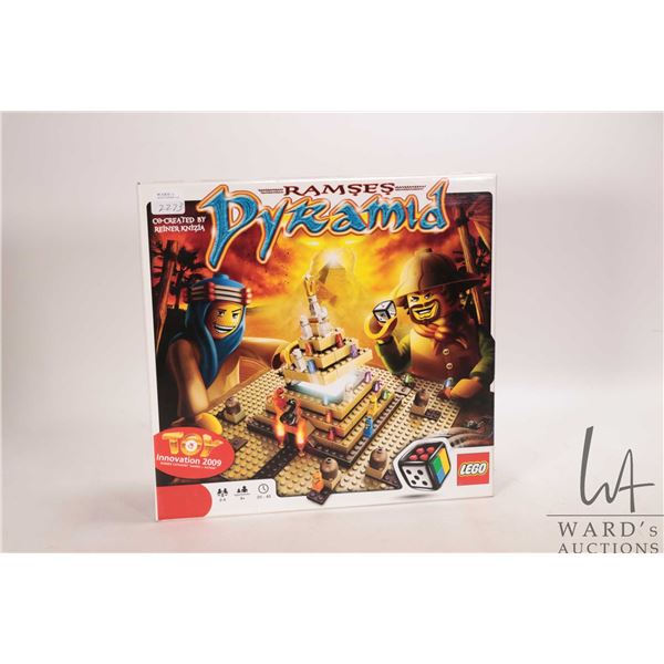 Lego "Ramses Pyramid" no. 3843 board game, in open box, with manual, completeness not confirmed. Bid