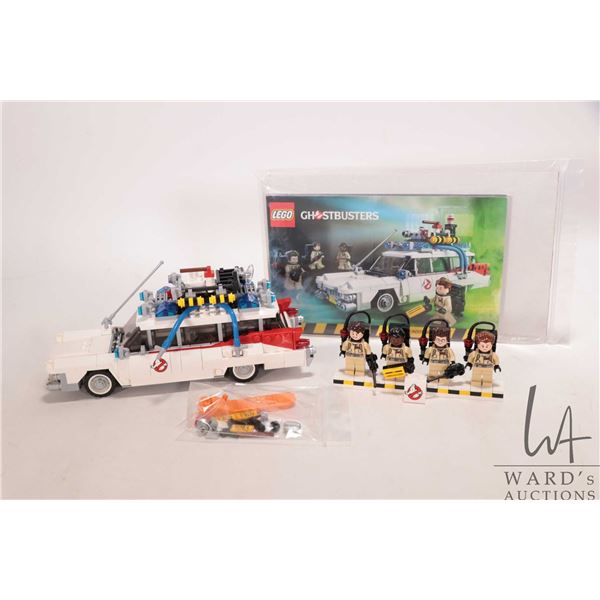 Lego " Ghostbusters" no. 21108 Ecto-1, pre-built kit with manual, four Minifigures, no box. Appears 