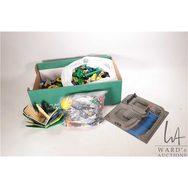 Large box of assorted Lego bases etc.