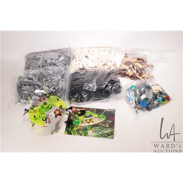 Large box of assorted Lego, mostly sorted by colour