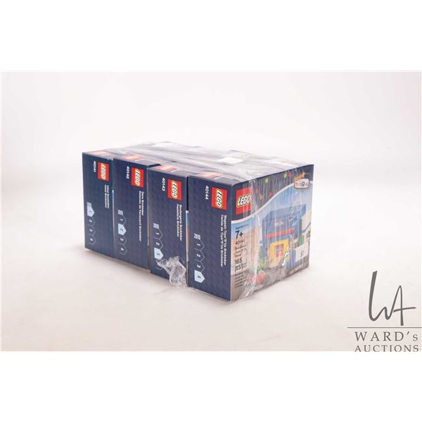 Four Lego ToysRus Exclusive Bricktober kits including 40141 Hotel, 40142 Train Station, 40143 Bakery