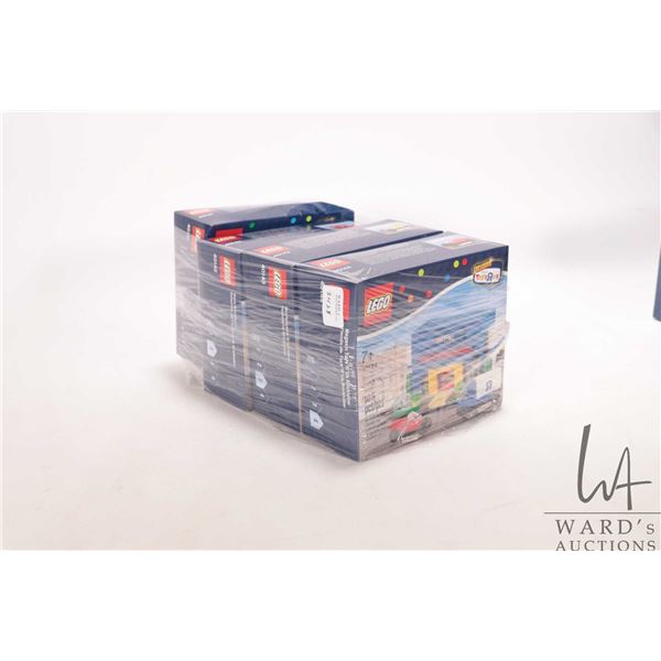 Four Lego ToysRus Exclusive Bricktober kits including 40141 Hotel, 40142 Train Station, 40143 Bakery