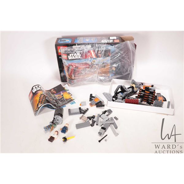 Two Lego "Star Wars" pre-built kits including no. 75137 Carbon Freezing Chamber and no. 75099 Rey's 