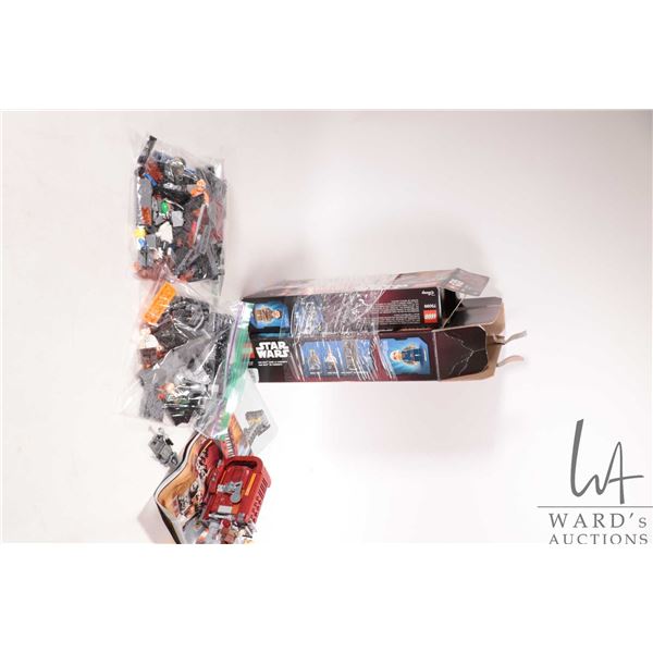 Two Lego "Star Wars" pre-built kits including no. 75137 Carbon Freezing Chamber and no. 75099 Rey's 