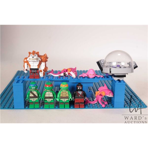 Lego "Teenage Mutant Ninja Turtles" Minifigures including Dog Pound, Raphael, Leonardo (gritted teet