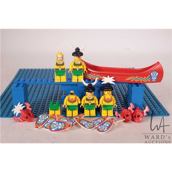 Lego "Islanders" Minifigures including Islander female, two Islander males, three King helmets, shie