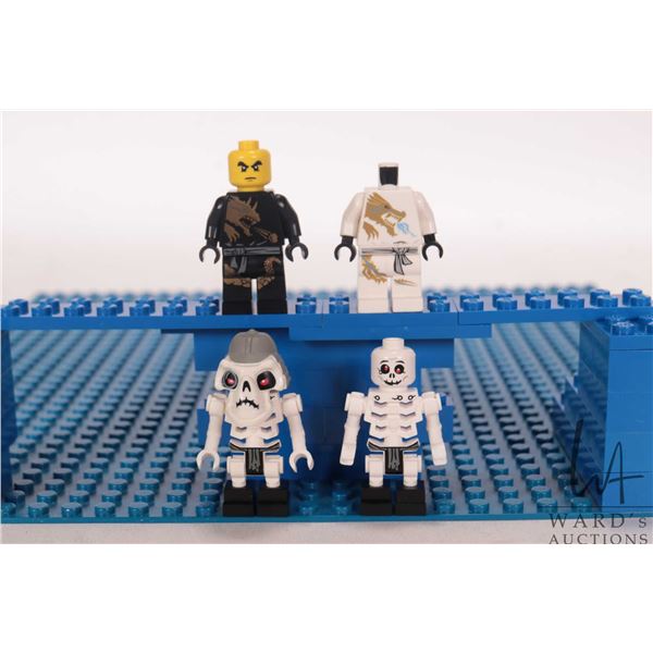 Lego "Ninjago" Minifigures including Cole DX (missing mask), Zane DX ( missing mask and head) , Krun