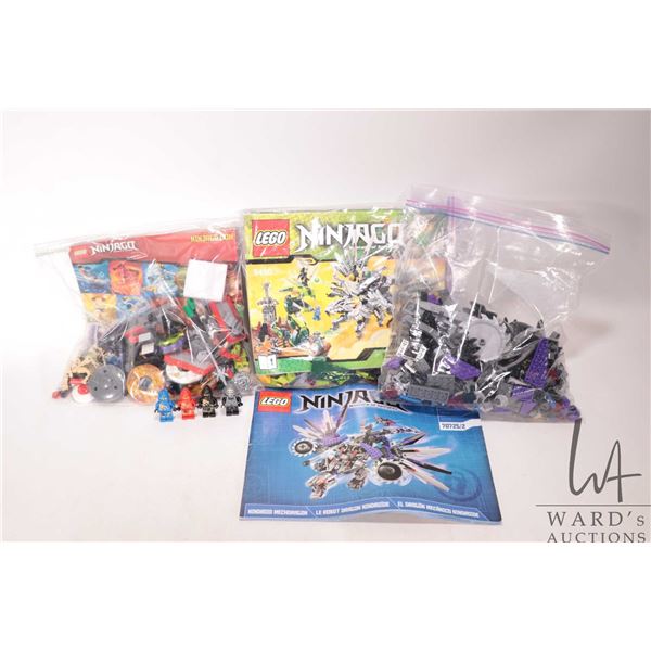 Three Lego "Ninjago" pre-built kits including no. 2540 Battle Arena, no. 9450 Epic Dragon Battle and
