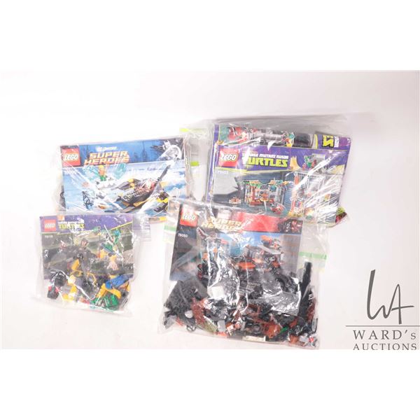 Selection of pre-built Lego sets including no. 46050 Cross Bone Hazard Heights, no. 76000 Arctic Bat