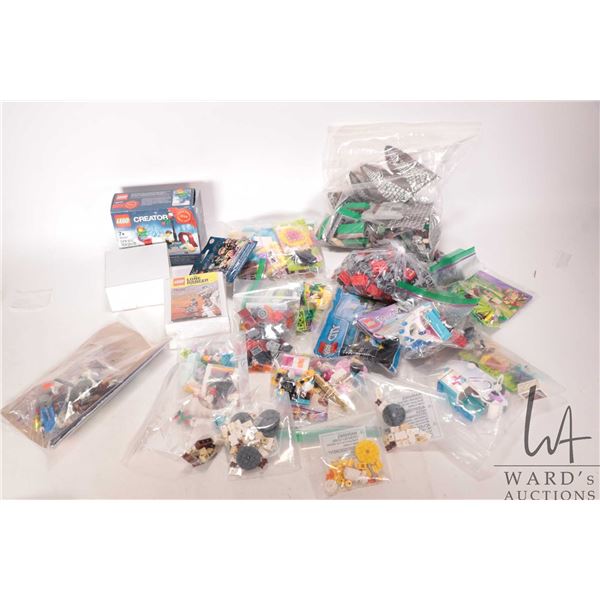 Box of pre-built Lego kits, "Friends", "Hobbit" etc. no boxes, no manuals, as-is