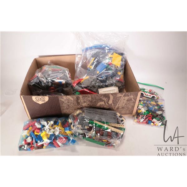 Five bags of assorted Lego bricks