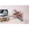 Image 2 : Lego Systems " Star Wars" no. 7140 X-Wing Fighter pre-built kit. Includes manuals and Minifigures. A