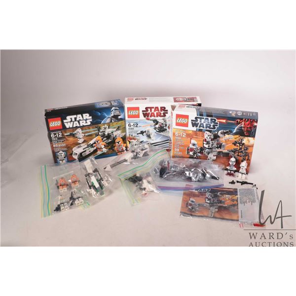 Three Lego "Star Wars" pre-built kits including no. 7193 Clone Trooper Battle Pack, with Minifigure,