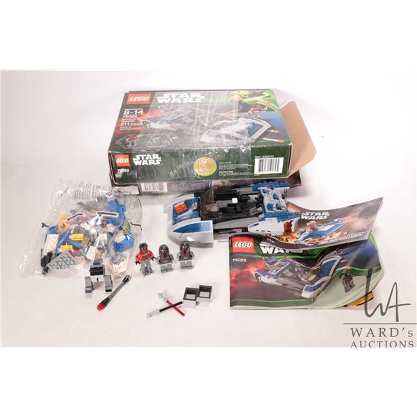 Two Lego "Star Wars" kits including no. 75196 A-Wing with factory sealed bag, manual and box and no.