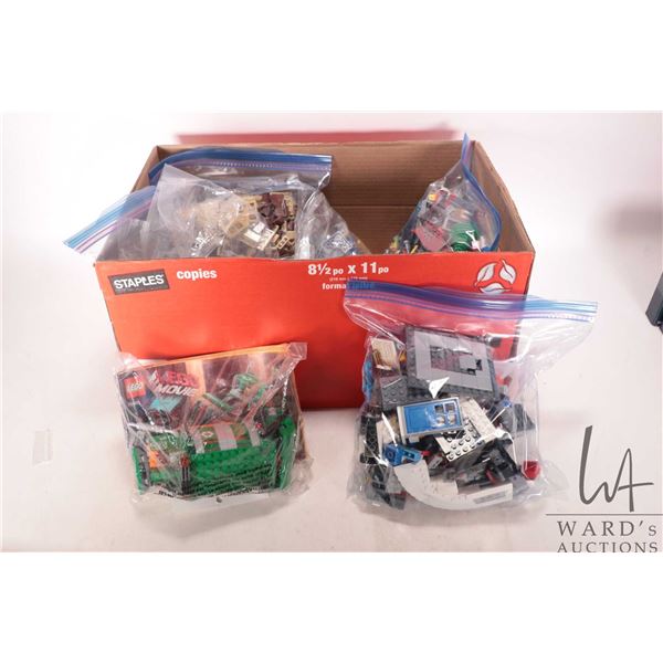Box containing six bags of assorted Lego including some kits, see photos