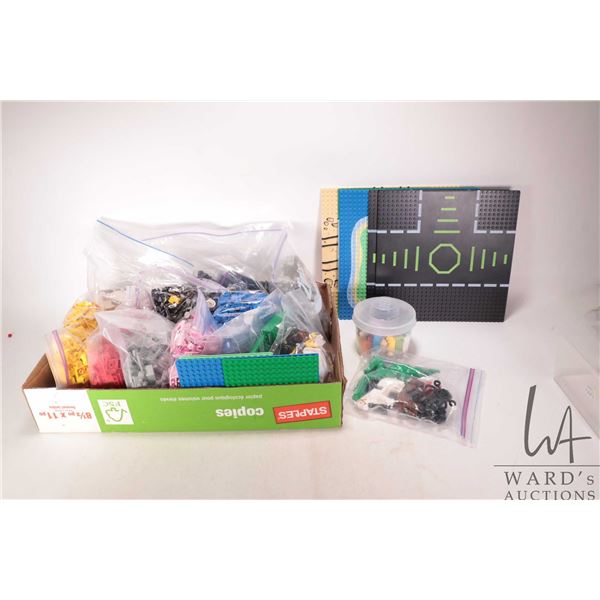 Large selection of Lego bricks and bases, each separated by colour