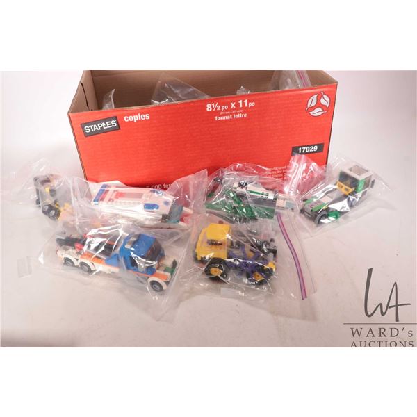 Box containing a selection of Lego pre-built vehicles, various themes. Completeness not confirmed or