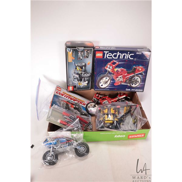 Selection of Lego "Technics" including no. 8422 Motorbike with manual and box, no.8166 Racecar with 