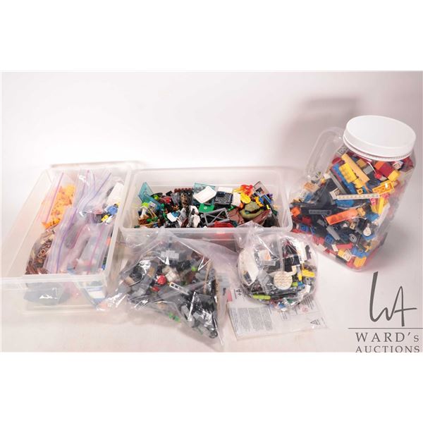 Box of Lego building bricks and Minifigures etc.