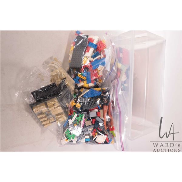 Two tubs of mixed Lego building bricks and accessories