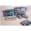 Image 1 : Three Lego kits including factory sealed "Disney Tron Legacy "no. 21314 kit, Lego "Back to the Futur