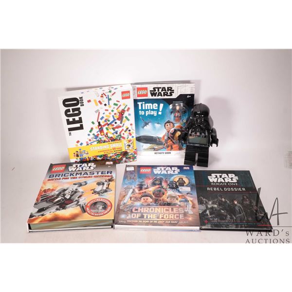 Selection of Lego hardcover books including "The Lego Book" double volume set, "Star Wars" Brickmast