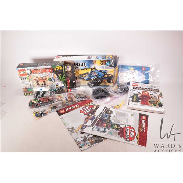 Selection of Lego "Legends of Ninjago" building kits including no. 70723 Thunder Raider pre-built ki