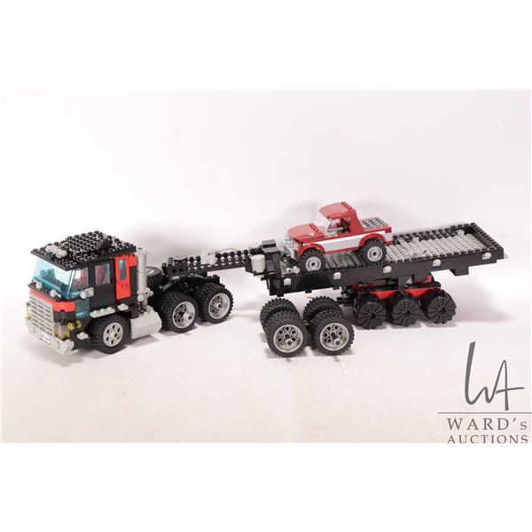 Box of Lego "Lego City" including pre-built vehicles, roadways etc.