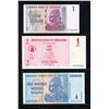 Image 1 : Zimbabwe $100 Trillion Note, with Two Earlier Notes