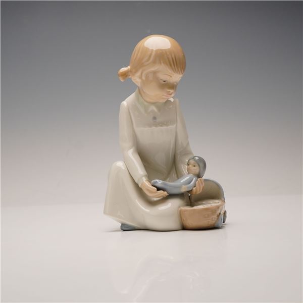Nao by Lladro Porcelain Figurine, Girl with Rag Doll