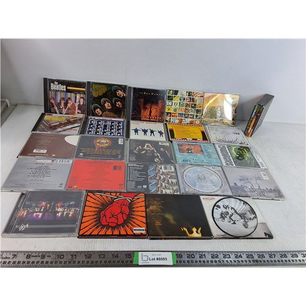Assorted CDs - The Beatles, Guns & Roses, Pearl Jam