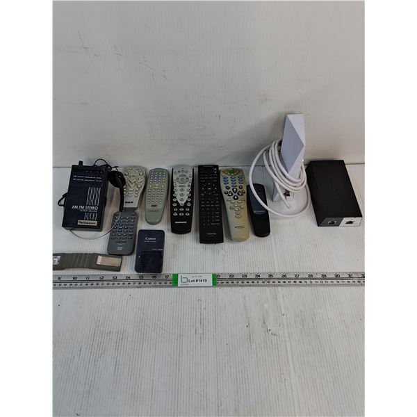 (7) Assorted Remote Controls,(2) Star Link Power Supply and Wi-Fi Router,Am/Fm Radio and misc.-as is