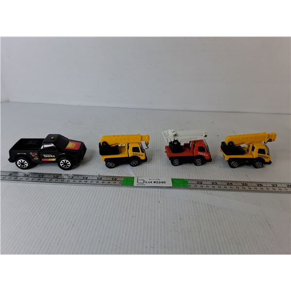 (4) Model Tonka Trucks Up to 5"